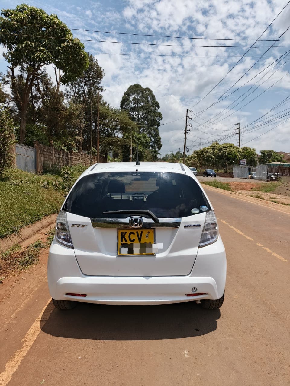 White Honda Fit Hybrid