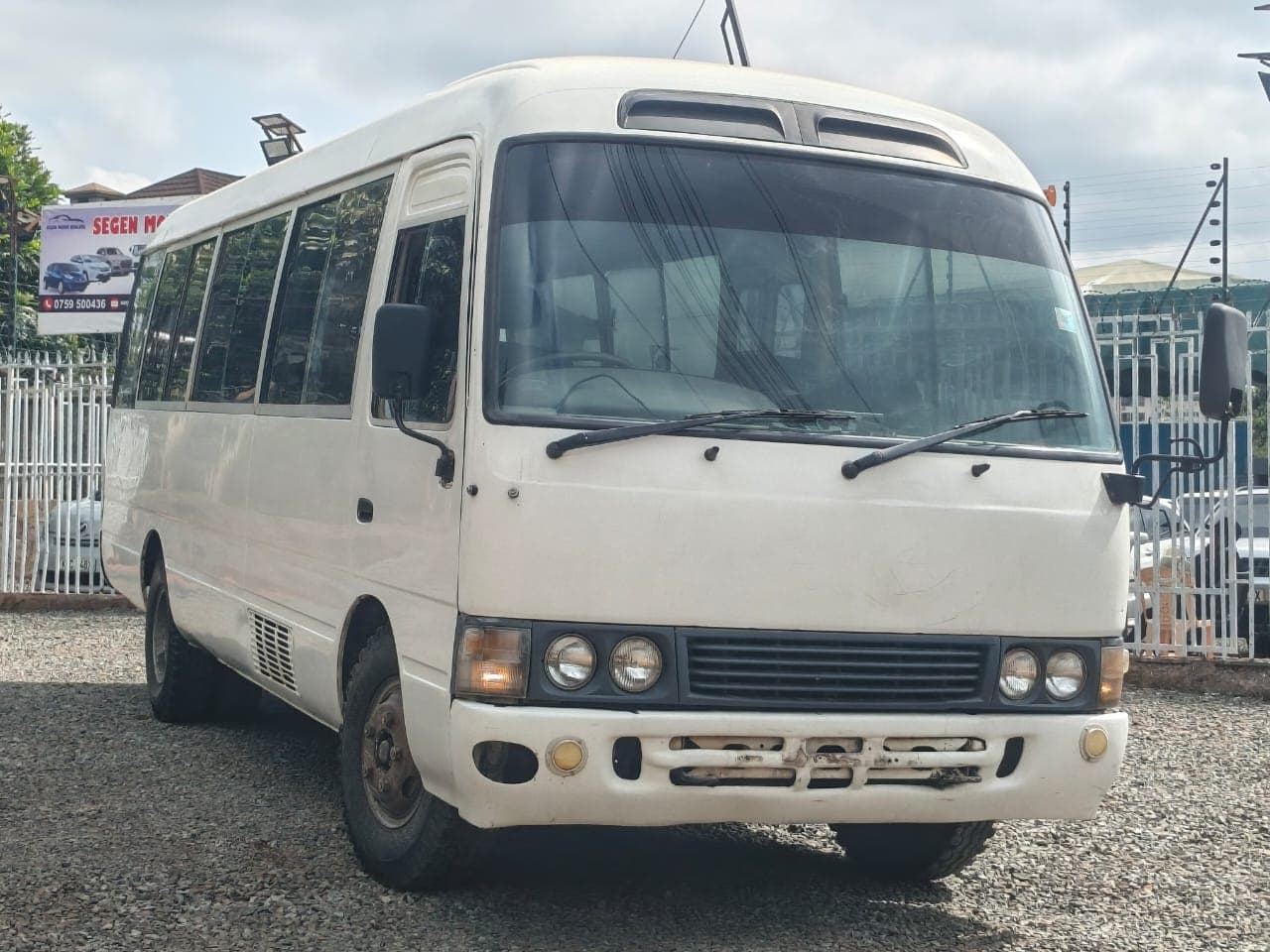 White Toyota Coaster